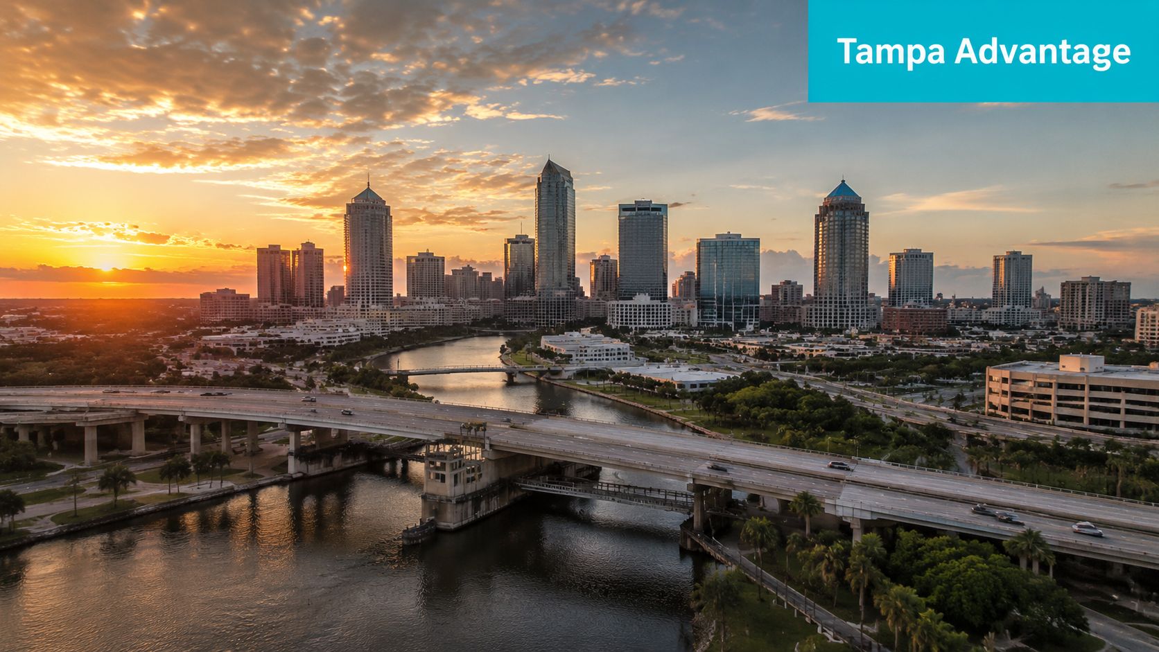A scenic sunset view of the Tampa, Florida downtown city skyline reflecting over the Hillsborough River.