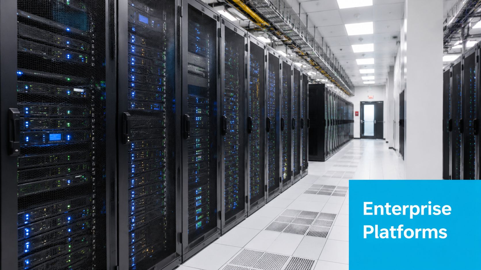 Rows of server racks inside a modern enterprise data center with bright ceiling lighting and tiled floors.